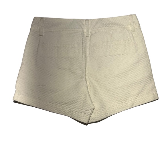 Lilly Pulitzer white eyelet shorts. Size 2. Super cute. Gold shiny button - Picture 10 of 14